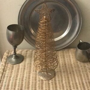 Cute little gold sparkly wire Christmas tree to add a bit of cheer